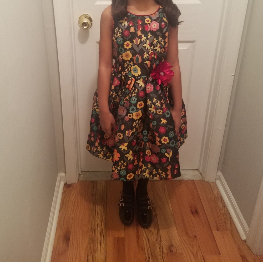 Girls size 7 pippa and julie dress. Black with multi-color flowers.